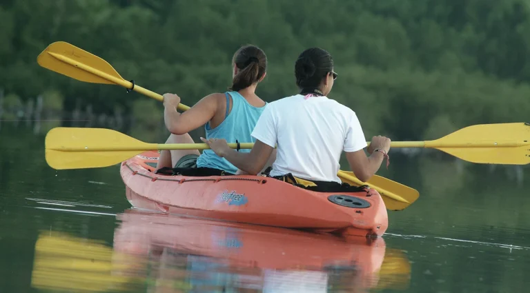 Two women kayaking at Kiani Lagoon, western Vieques National Wildlife Refuge