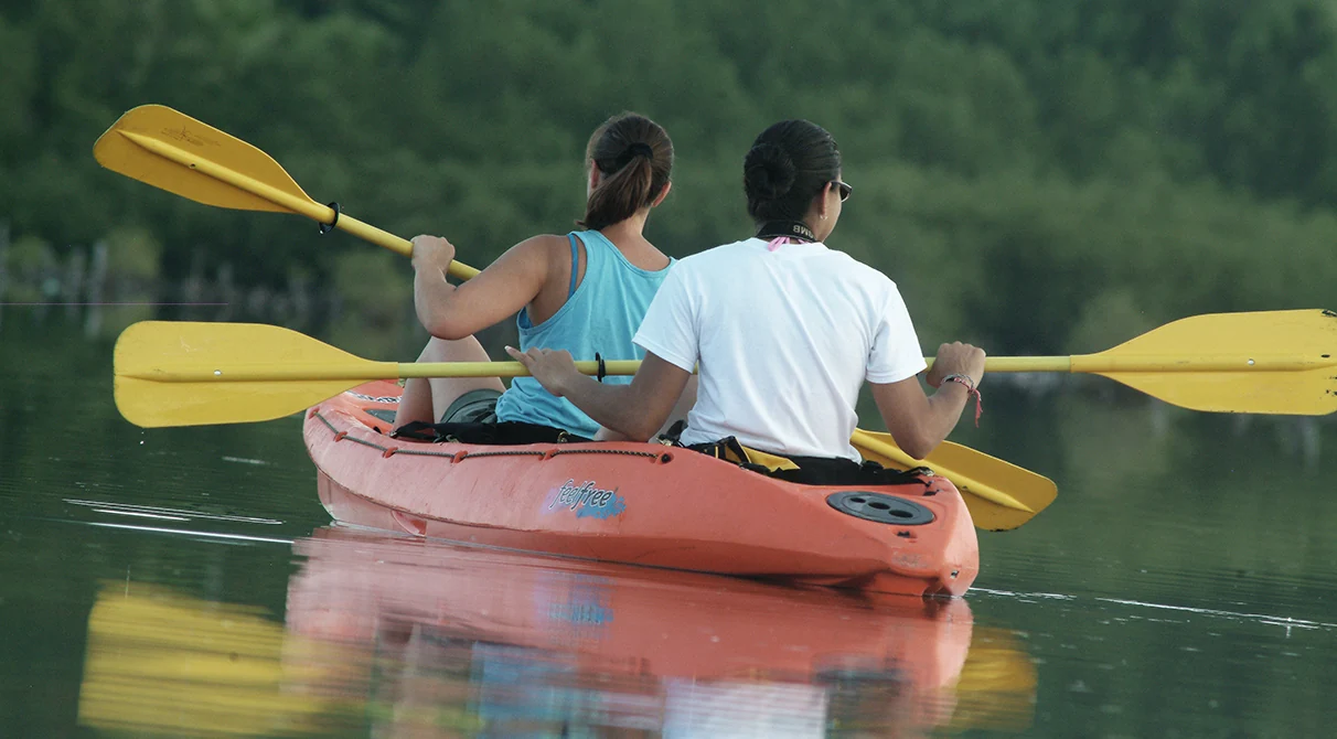 Two women kayaking at Kiani Lagoon, western Vieques National Wildlife Refuge